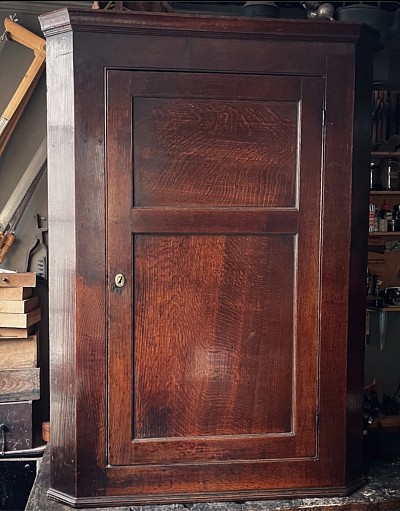 Georgian oak corner cupboard.