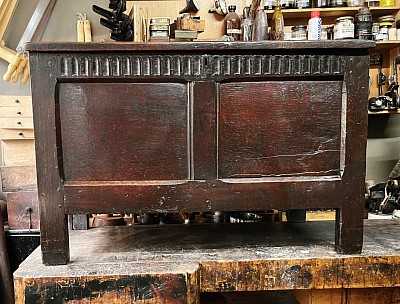 17th century oak panelled chest.