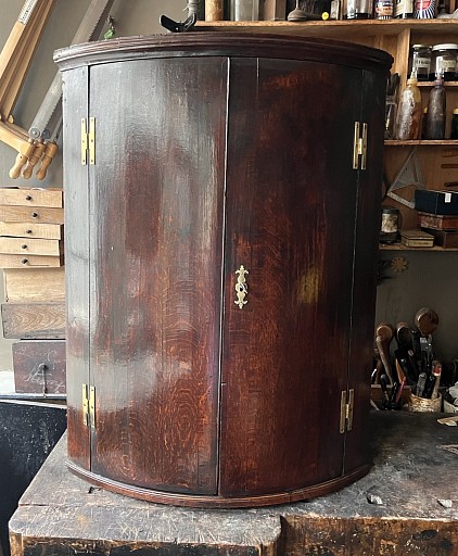 Georgian oak corner cupboard.